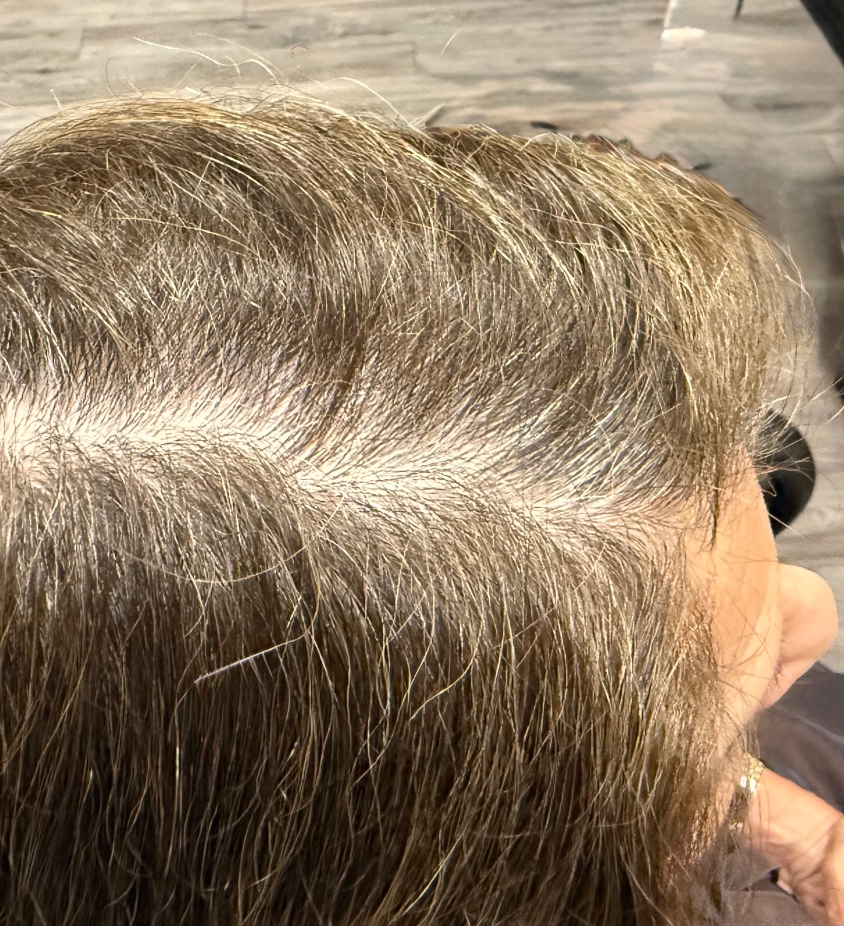 Before gray blending root touch-up on a client over 40 at Ray Rose Style, Austin, Texas.